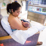 Mother nursing newborn in the hospital
