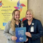 Dr. Orgel on the left and Dr. Goode, Director of the NEC Biorepository on the right