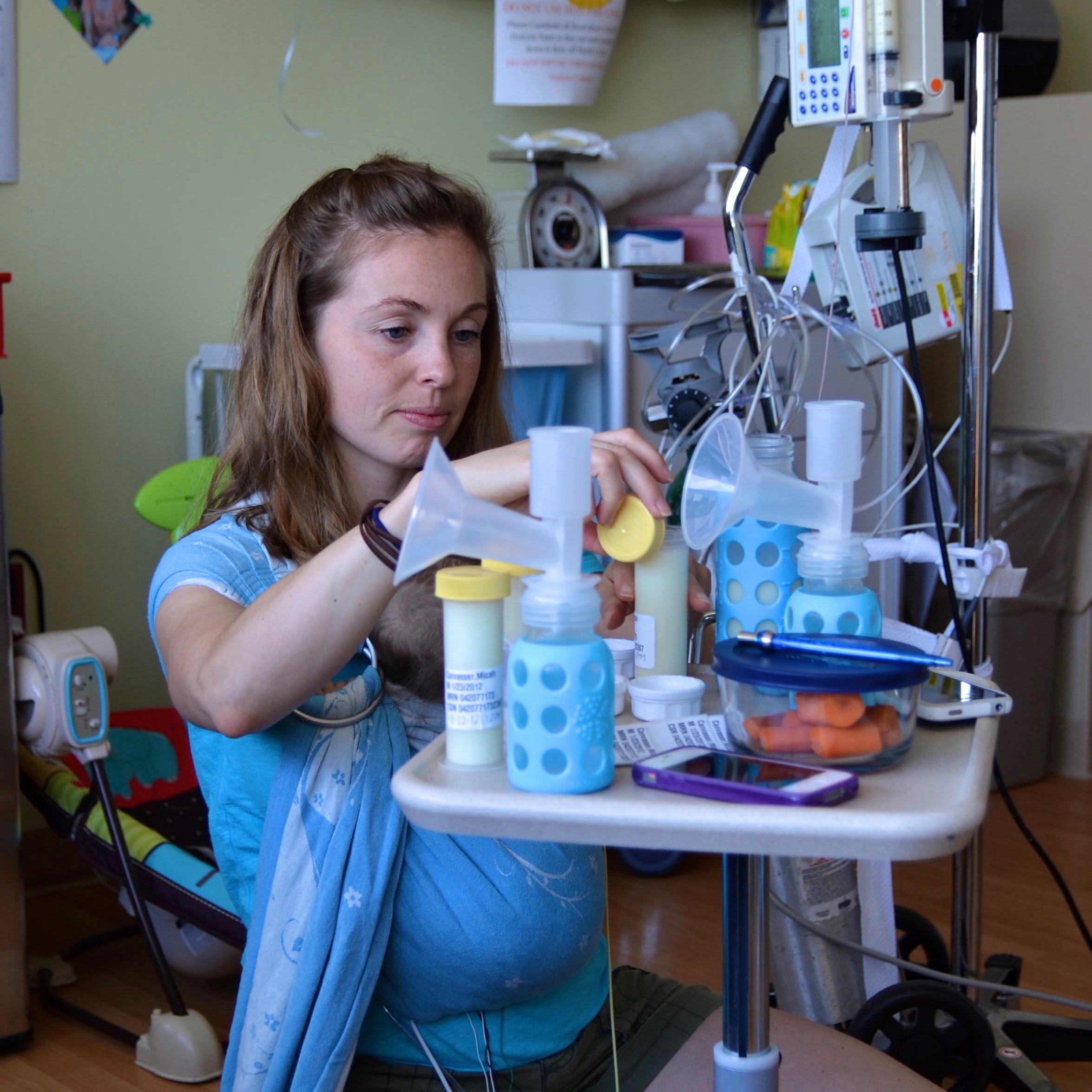 Jenn prepping bottles for her son Micah's feeding tube
