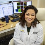 Dr Geoanna Marie Bautista sitting at her desk