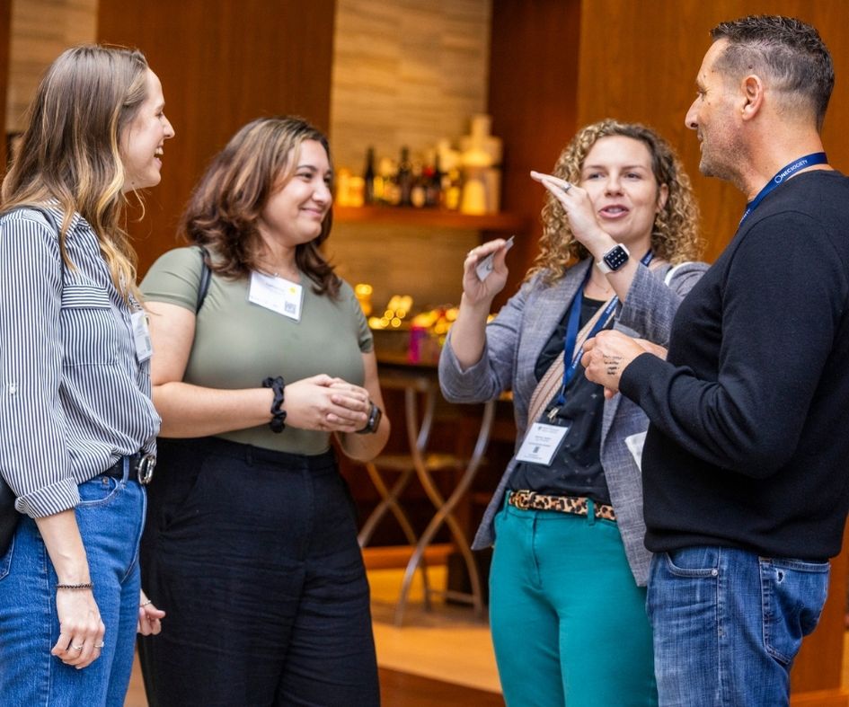 People networking and smiling