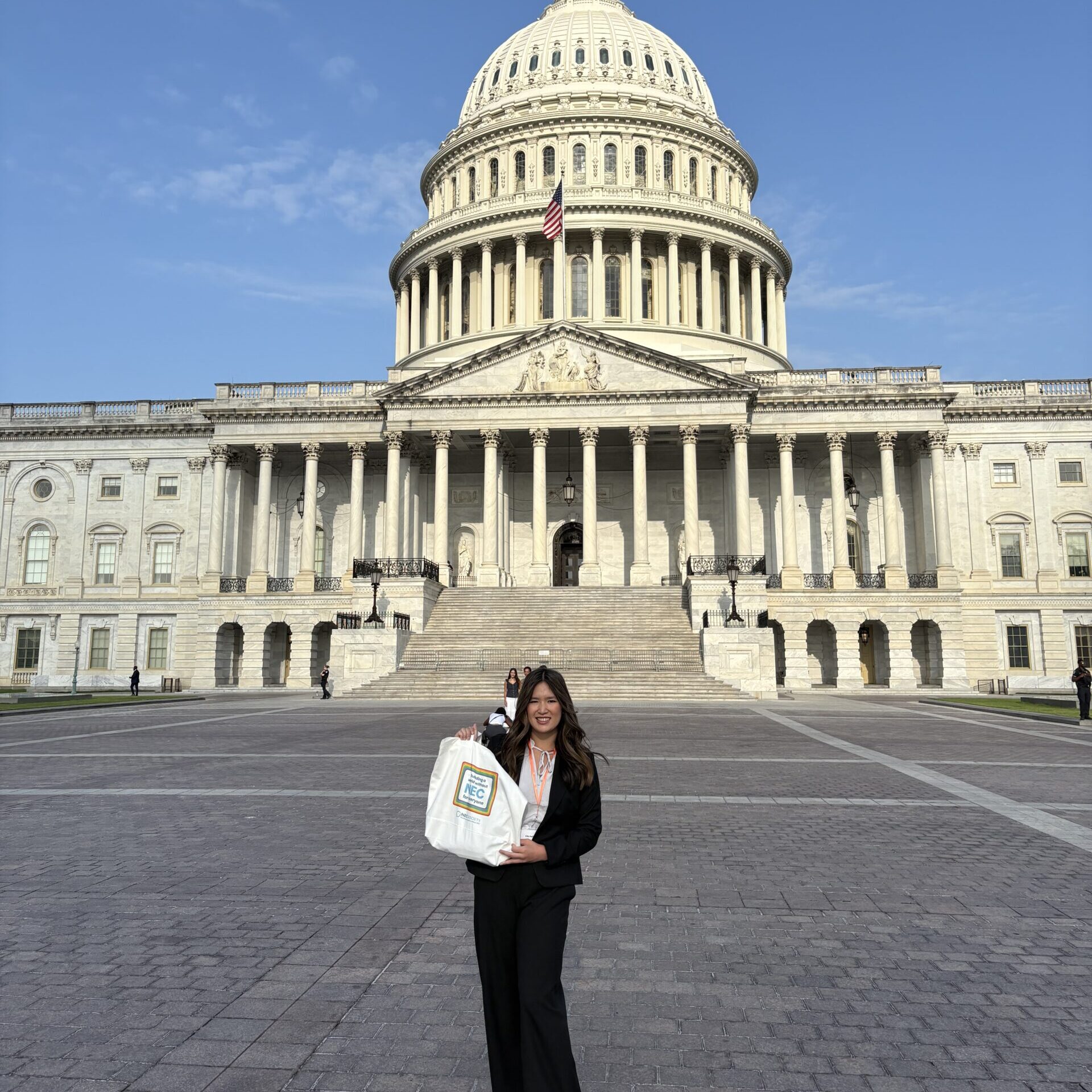 woman standing in front of the US capitol